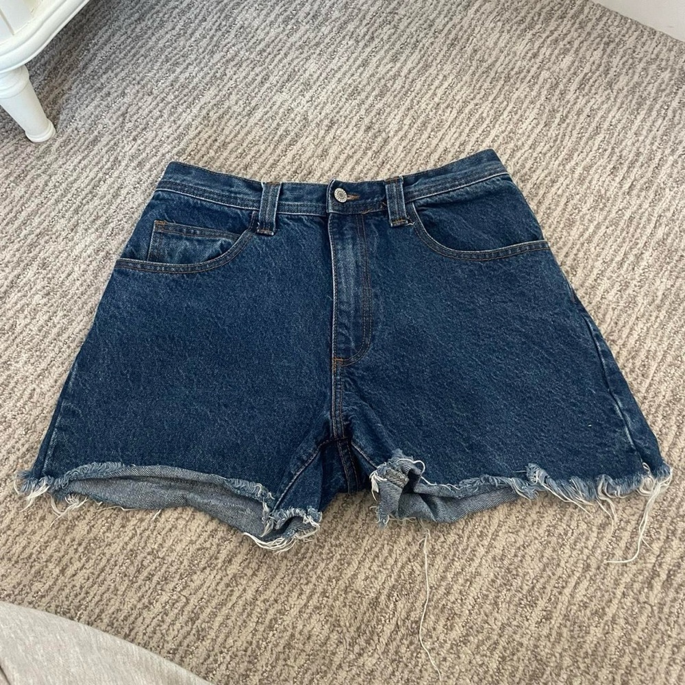 brandy melville medium wash denim shorts with frayed distressed seems